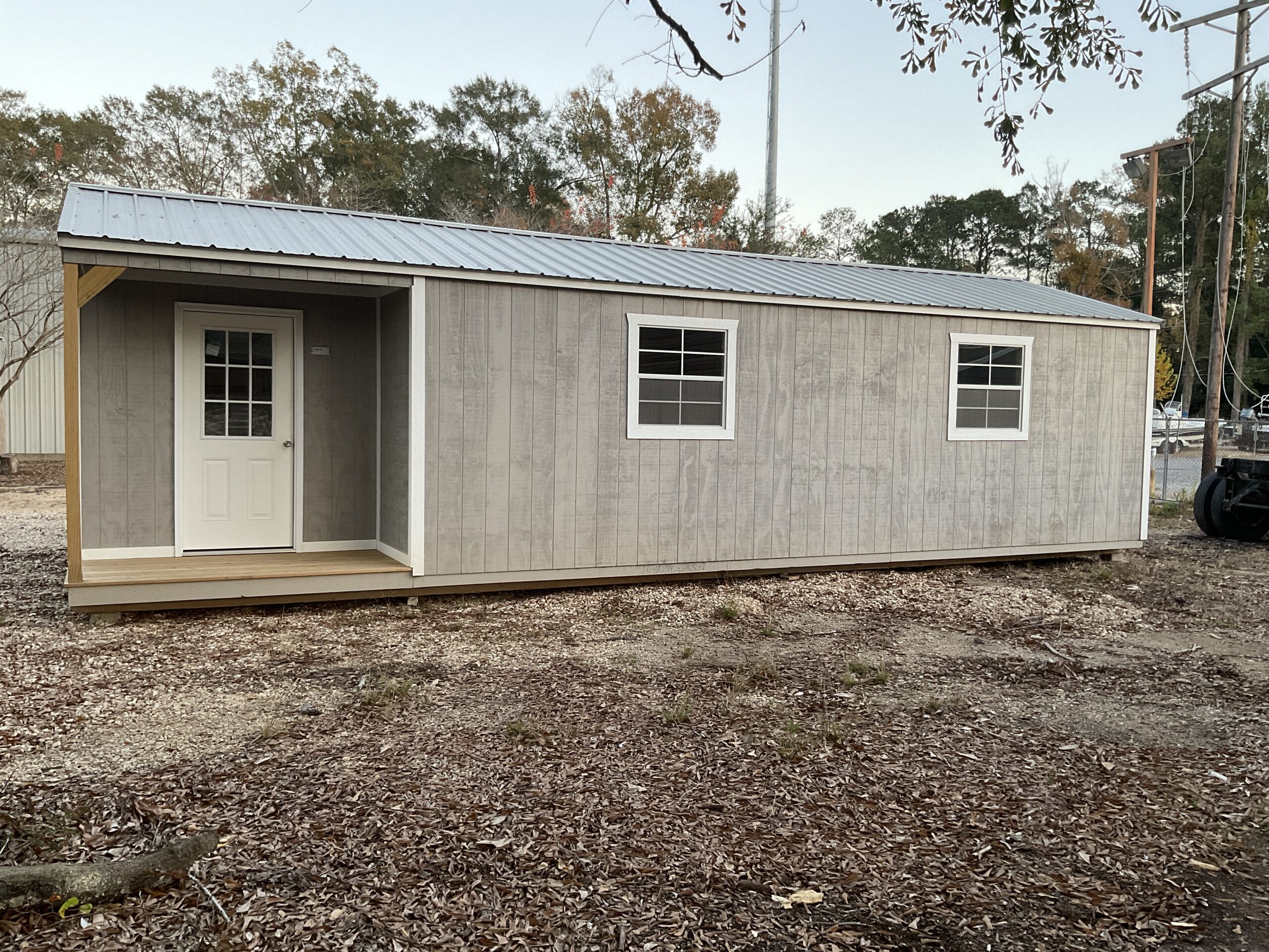 14×36 Corner Porch Cabin in Covington LA (250389) | Johnson Portable Buildings