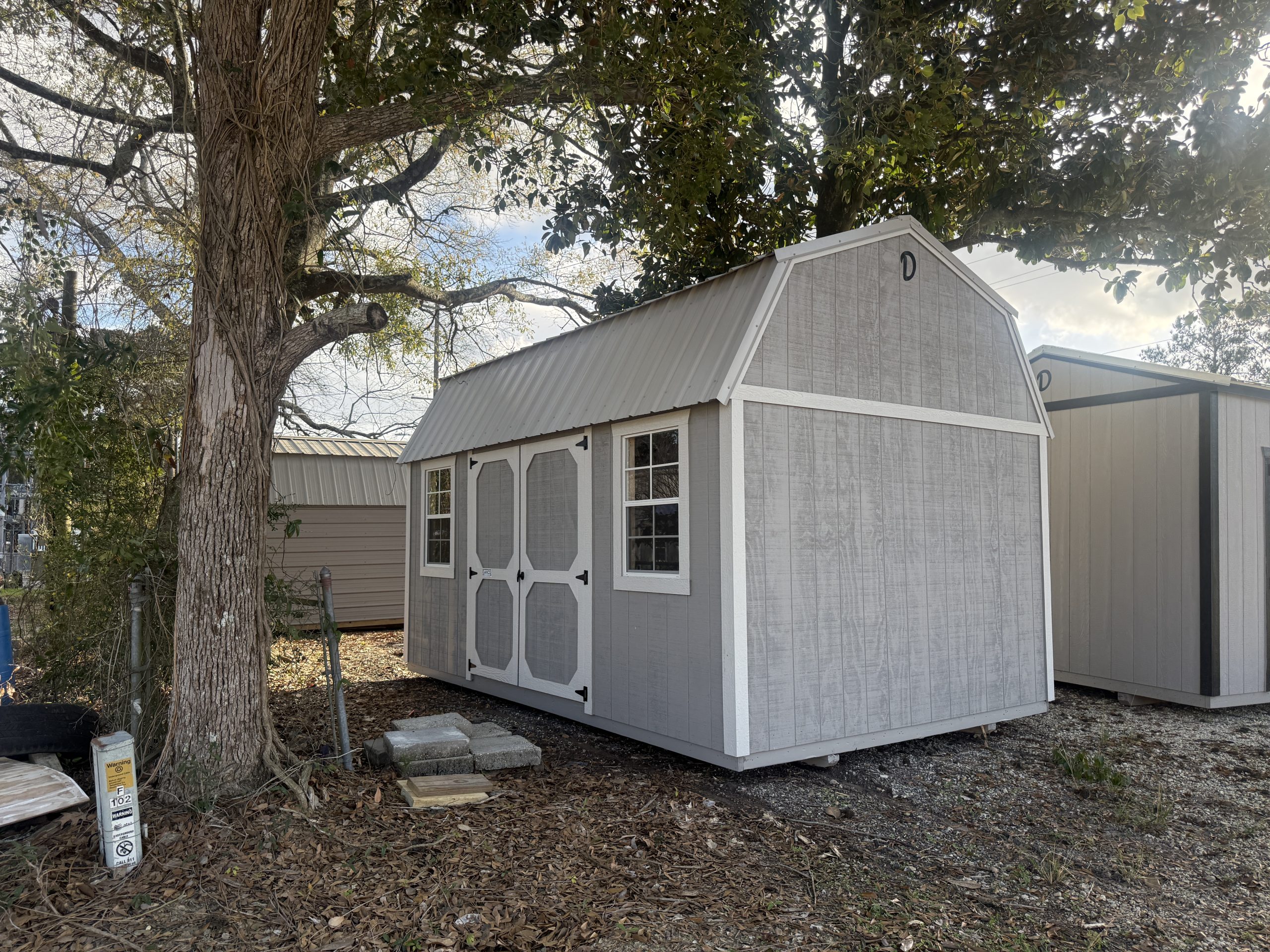 10×16 Side Lofted Barn in Covington LA (260117) | Johnson Portable Buildings