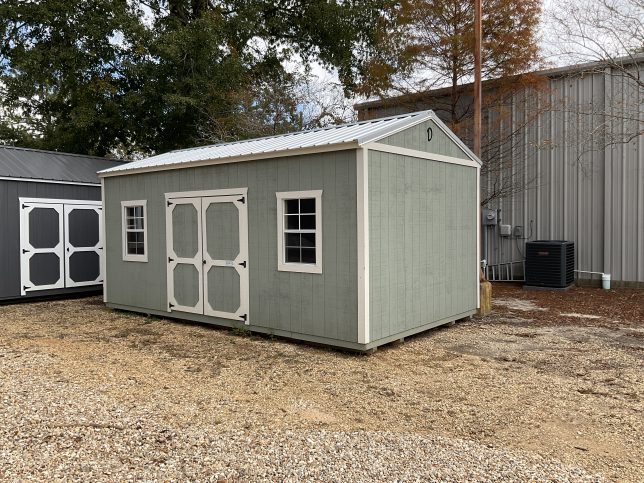 12x20 storage building Covington LA with double wood doors and outdoor storage space