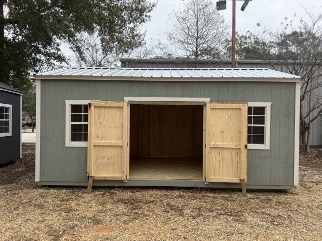 12x20 garden shed for sale in Covington LA with double wood doors and front windows