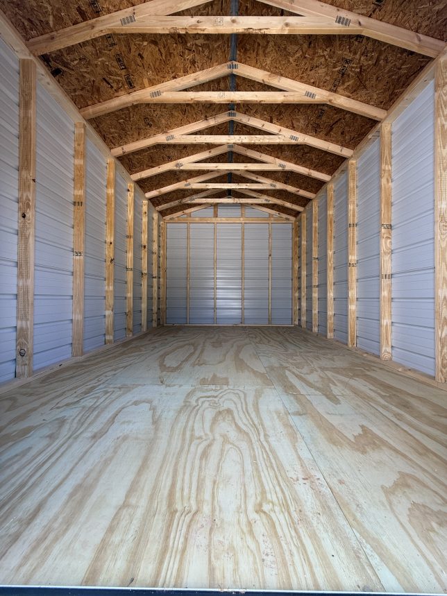 Inside view of metal shed showing framing walls and roof structure