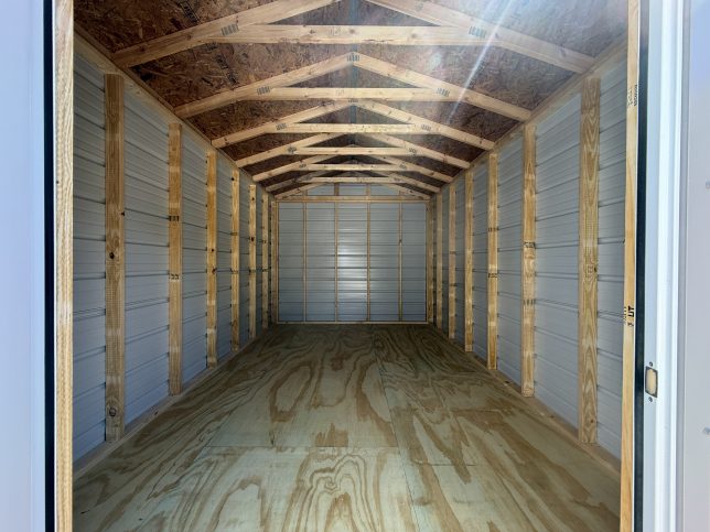 Interior of 10x16 metal shed with wood framing and treated plywood floor
