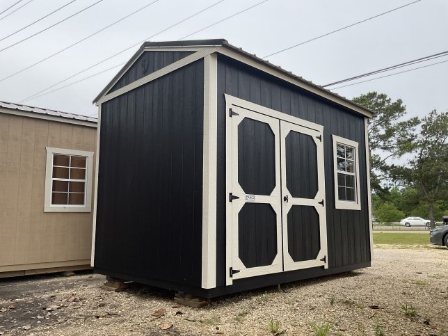 8x12 black garden shed with tall roofline and double wood doors in Covington LA
