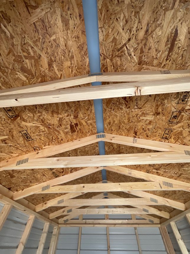 Engineered roof trusses inside 8x12 utility shed in Covington Louisiana.