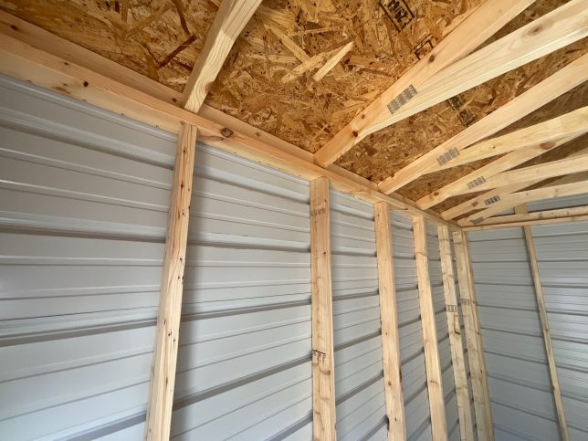 Wall framing inside 8x12 utility shed available in Covington LA.